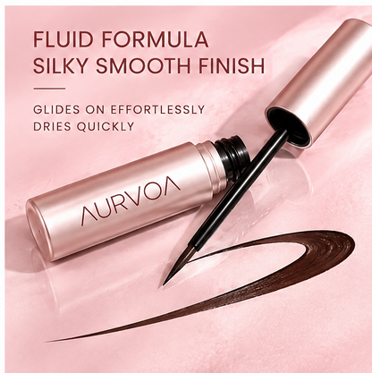 AURVOA Brush Eyeliner - fluid formula silky smooth finish glides on effortlessly dries quickly rose gold bottle laying with brown swatch
